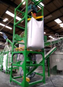 Bigbag bulk bag emptying unloading system for mixer filling with dosing screw conveyor