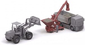 Front end loader collects bulk material from stockpile, filling the hopper of mobile truck loading system and dustless loading of the truck.